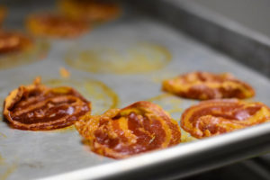 Crispy pancetta on baking sheet